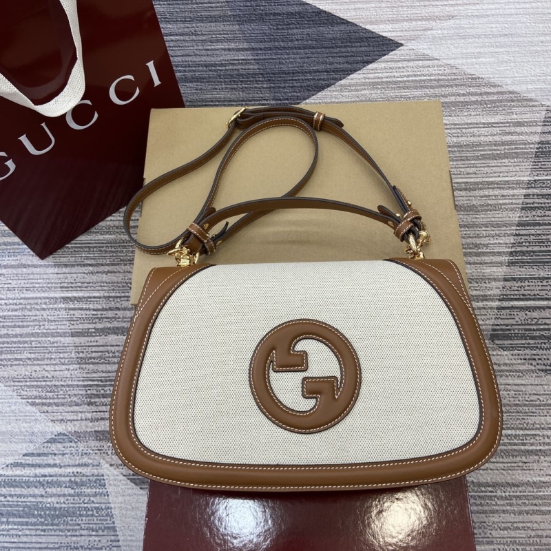 G*u*i top handle bags